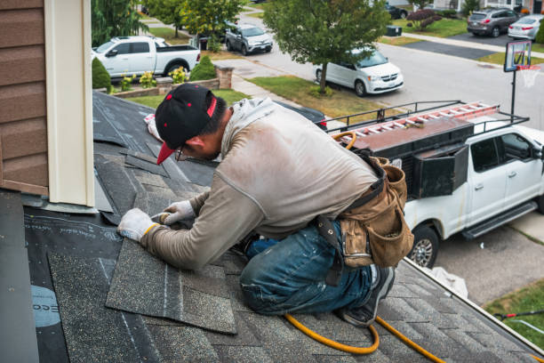 Professional Roofing technician working in South Glastonbury, CT
